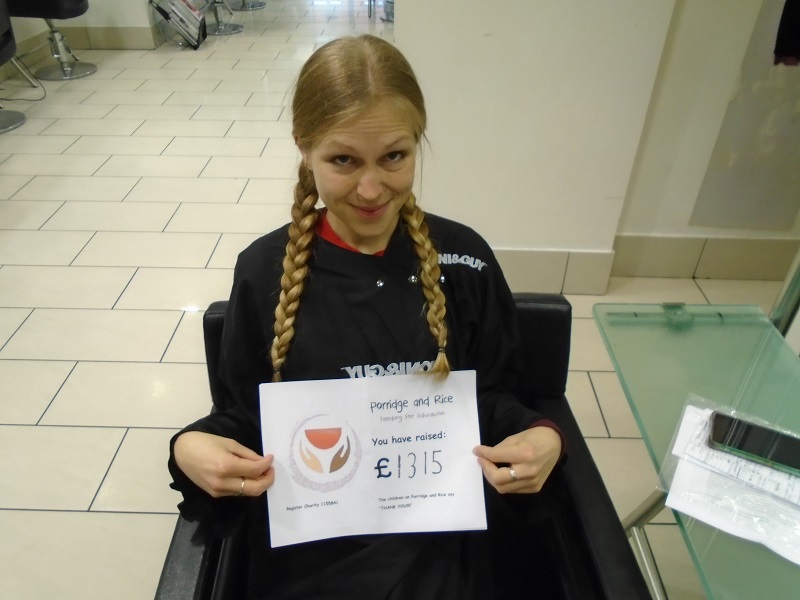 emma, vice-chair of Poridge and Rice, raised �1315 for the work of Porridge and Rice by cutting her long hair