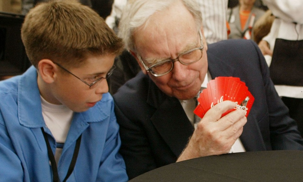 Warren Buffet shares his knowledge of the game Bridge with a younger player